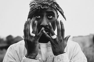 The Life & Death of Tupac Amaru Shakur: Hip-Hop’s Most Iconic Figure