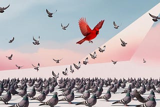 Image of a red cardinal standing out in a sea of pigeons.