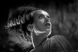 An actress in a monster movie performs in makeup