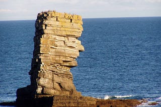 How are stacks, needles and stumps formed by the coast?