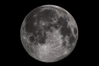 Detailed moon on black background.