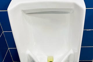 Close up picture of a urinal