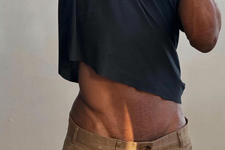 reedy thin. t-shirt and pleats
