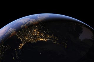 This is a photo of the Earth from space, showing the thin blue line of our atmousphere.