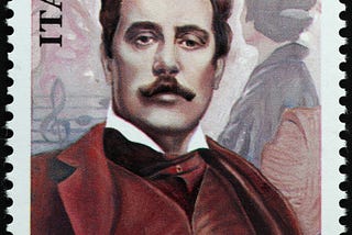 Italian postage stamp with picture of composer Giacomo Puccini