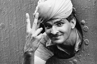 Indian soldier in WW2 giving victory sign