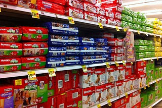 Rows of disposable diapers in a supermarket