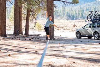 guy balancing on a slack line