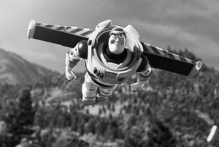 A black and white picture of Buzz lightyear from Toy Story flying