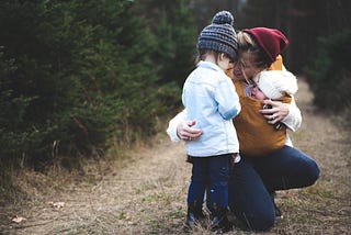 mother and two children hiking. image courtesy of pexels.com