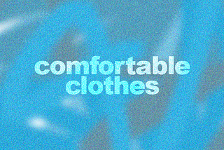 header image with a burry background that is various shades of blue, the text in white reads “comfortable clothes”