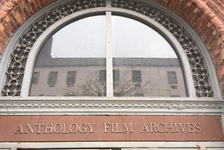 Front door sign of Anthology Film Archives located at 32 Second Avenue.