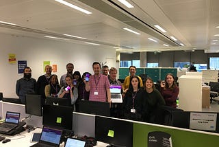 The team 5 minutes after new website go-live, proudly displaying it on all the screens!