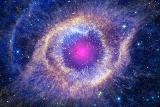 Helix Nebula, courtesy NASA; contains IR data from NASA’s Spitzer Space Telescope (green and red), optical light from Hubble (orange and blue), UV from NASA’s Galaxy Evolution Explorer (cyan), and Chandra’s X-rays (appearing as white) showing the white dwarf star that formed in the center of the nebula. Image is about 4 light years across. Image credit: X-ray: NASA/CXC; Ultraviolet: NASA/JPL-Caltech/SSC; Optical: NASA/STScI (M. Meixner)/ESA/NRAO (T.A. Rector); Infrared: NASA/JPL-Caltech/K. Su)