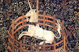 an ancient tapestry depicting a unicorn in captivity