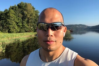 Picture of the author with a river in the background.