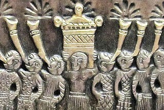 Bas relief showing a priest carrying the Ark of the Covenant accompanied by trumpeters