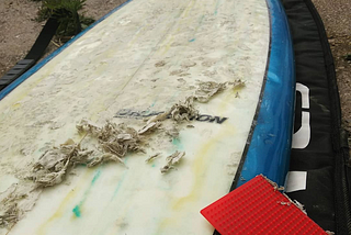surfboard wax removing