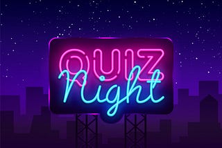 A neon sign that says “Quiz Night”, over a cityscape at night.