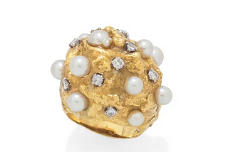 Enormous lumpy gold ring dotted with pearls and diamonds