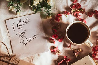 A greeting card saying “Follow Your Dream”.