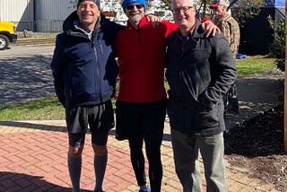 Post race with Tim (my right) and Doug (my left). Notice my short white socks. Photo property of author.