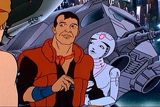 Dagg and his fembot show you just how bad a star wars knockoff film can be. Sure, they’re just standing in front of a not-star-wars-ship, but still.