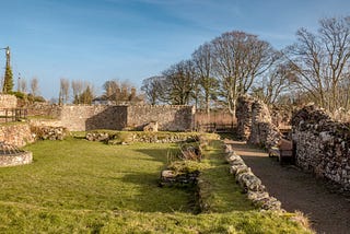 Grass topped ruins and walls of the ancient Coldingham Abbey, Scottish Borders, Scotland