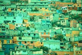 Rooftops in our former hometown of Pachuca, dotted with black water cisterns that are called tinacos. One of many homes that probably had mold. Photo: Uriel Miskas, Unsplash