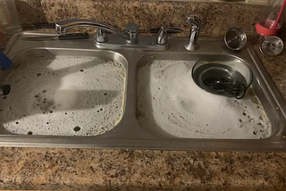 I just used these two tricks to unclog my double kitchen sink!