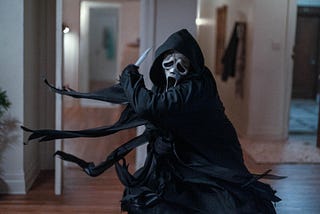 Photo of Ghostface wielding a knife in Scream VI, released in 2023.