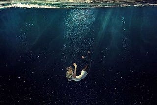 A girl drowning into something she doesn’t recognize and repeating.