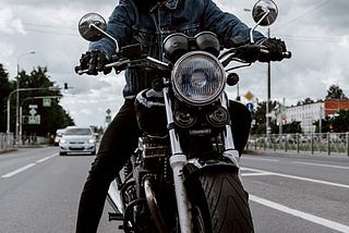 A man riding a motorbike.