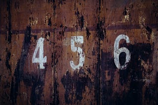 An image with the numbers 4, 5 and 6 on a wall