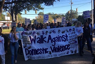 Students march against domestic violence