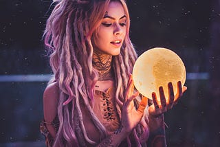 A woman looking into a crystal ball