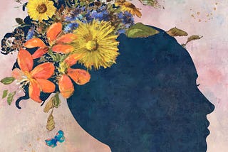 A silhouette of a woman with flowers blooming from her head.