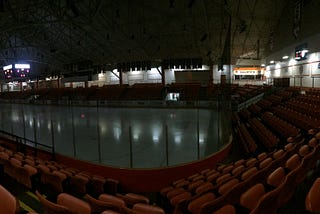 Photo of Trail’s Cominco Arena early in the morning with the lights out.