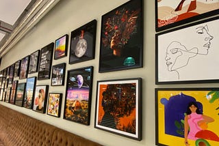 A wall covered with a variety of colourful images
