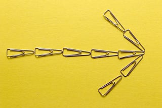 An arrow made of paperclips