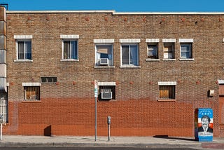 Brick building on street