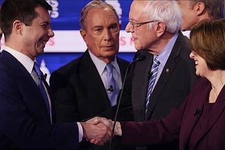 Buttigieg’s Stubble, and Klobuchar’s Bang-Shake