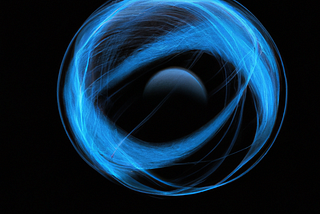 an orb spnning in a ball of light
