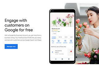 A lady with a vase of flowers beside the smartphone showing Google Business