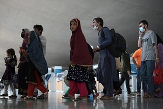 Immigrant Kids in Chicago Carry More Than Books…They Carry Their Families