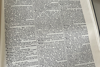 Picture of a page from the Shorter Oxford English dictionary with tiny print