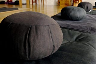 Pillows arranged for group meditation
