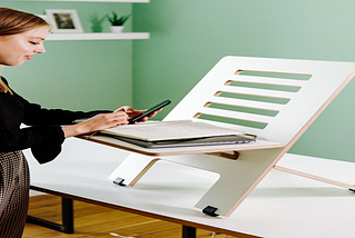 How can a standing desk polish up your work?