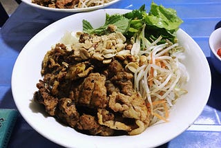 Happiness is a bowl of bún chả in the rain