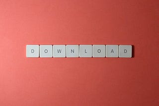 Picture of the word “download” with a red background.